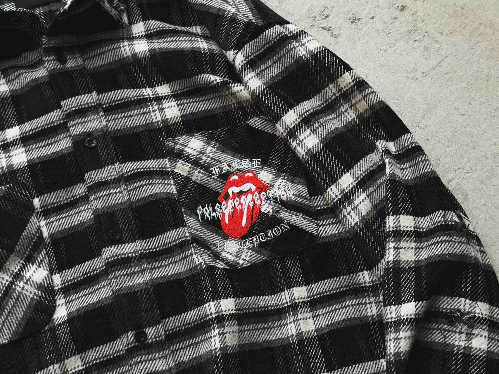 False Perception Tongue Logo Black‑White Plaid Shirt